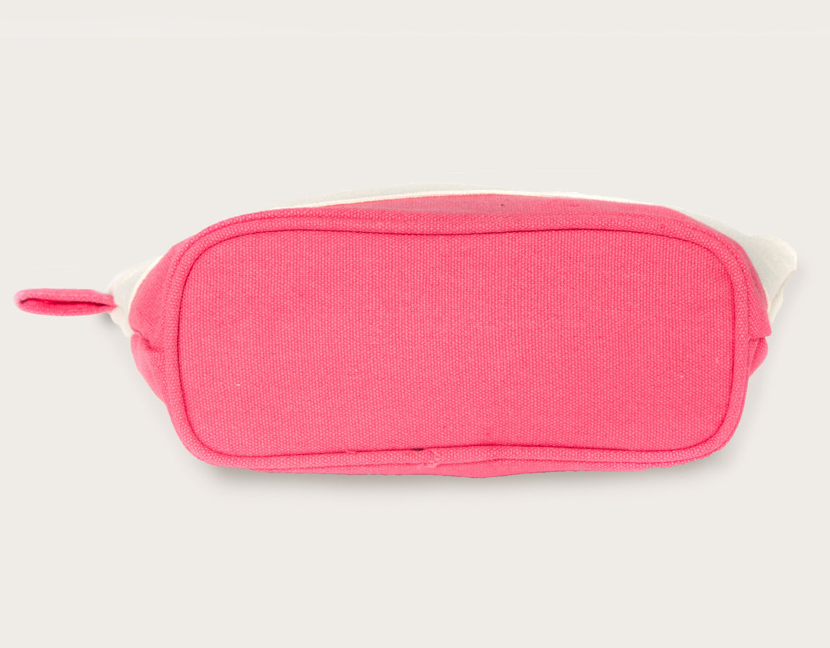 The Getaway Canvas Cosmetic Bag — pink bag with white trim