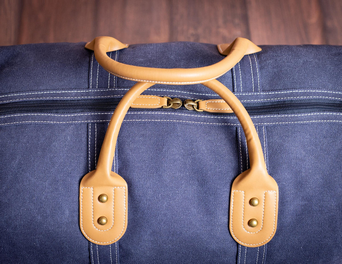 The Wanderlust Canvas Duffle, Indigo with Vegan Leather