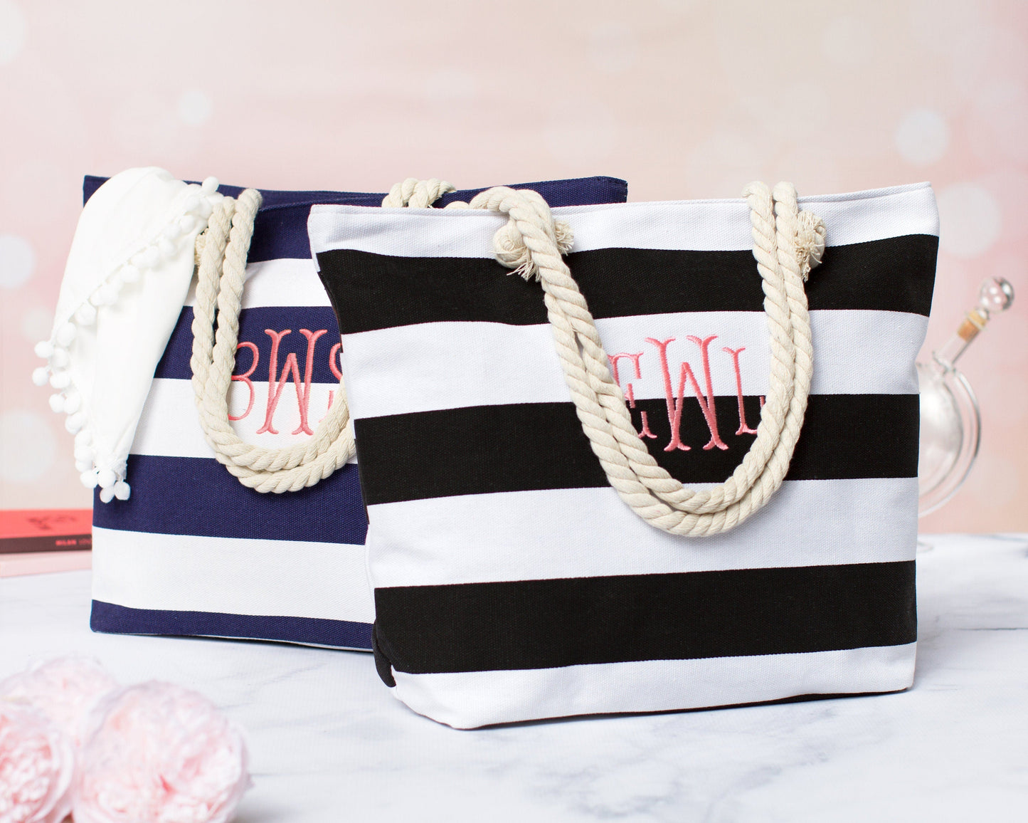 Navy and black bold stripe monogrammed totes on marble with fresh flowers