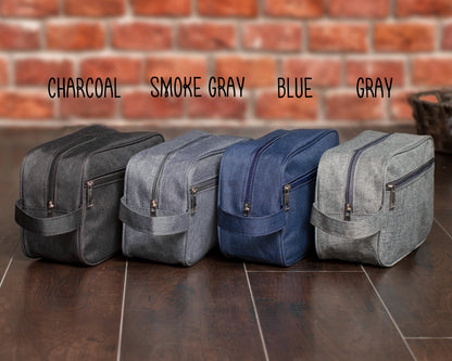 Color guide: four dopp kits side by side in Charcoal, Smoke Gray, Blue and Gray