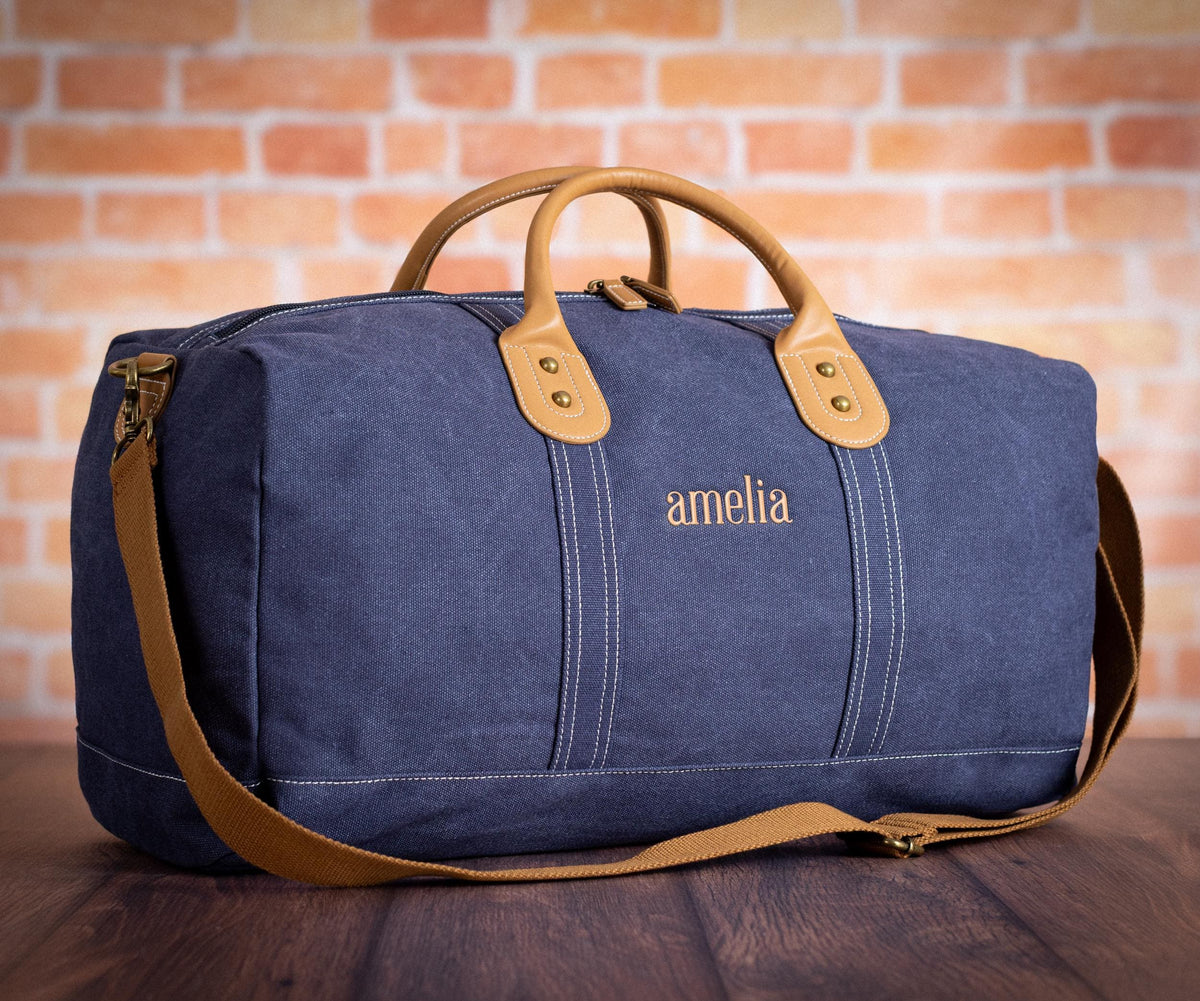 The Wanderlust Canvas Duffle, Indigo with Vegan Leather