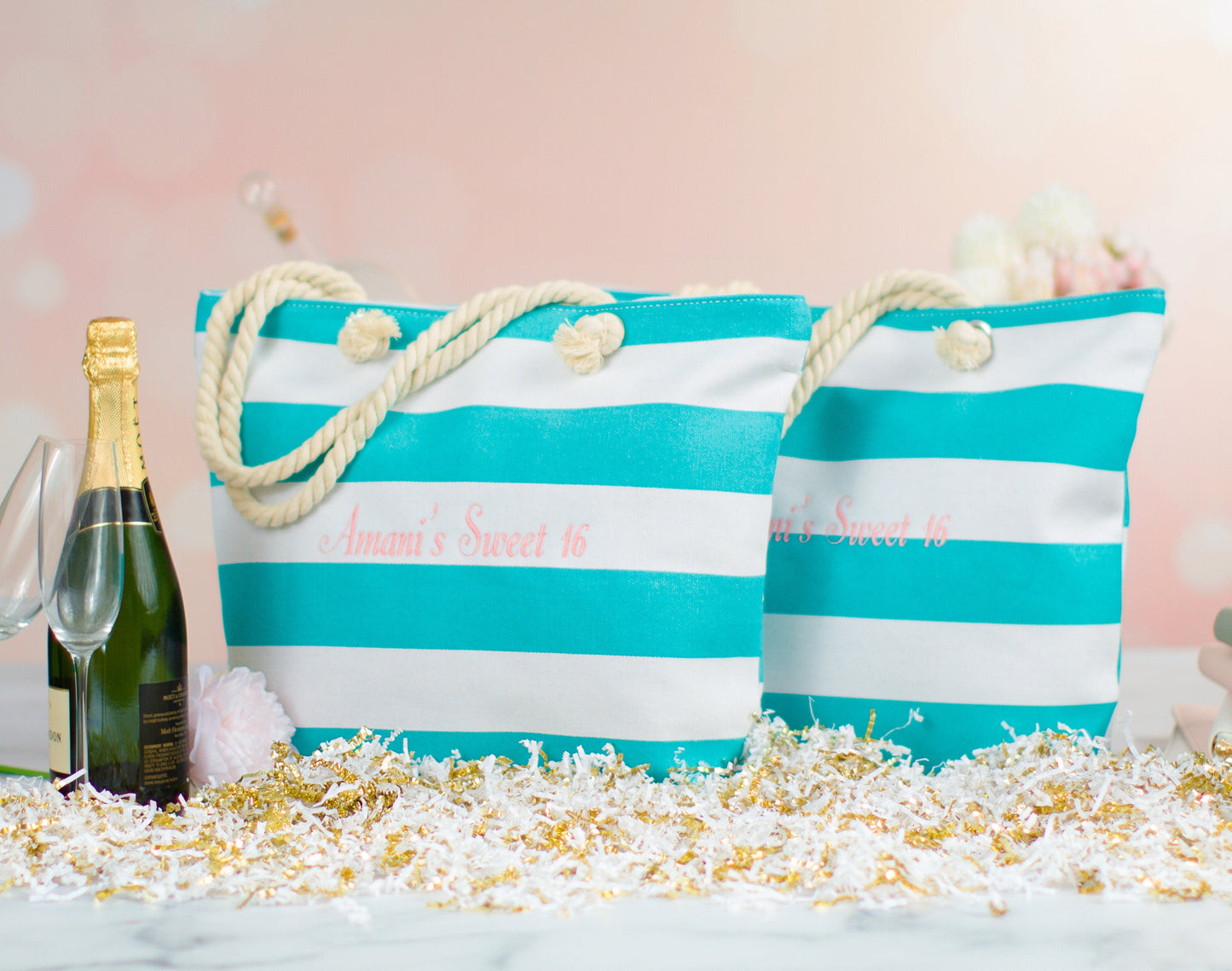 Two turquoise bridesmaid tote bags with champagne and gold confetti, styled as a wedding party gift