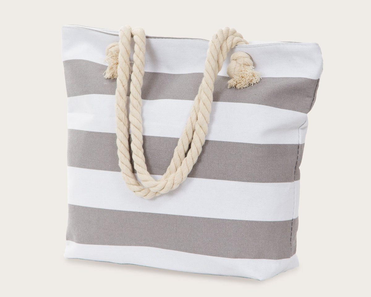 Gray and white bold stripe beach tote on a plain background, showing the full shape and rope handles