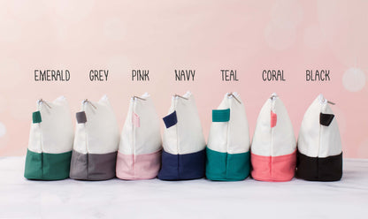 The Getaway Canvas Cosmetic Bag — all seven colors